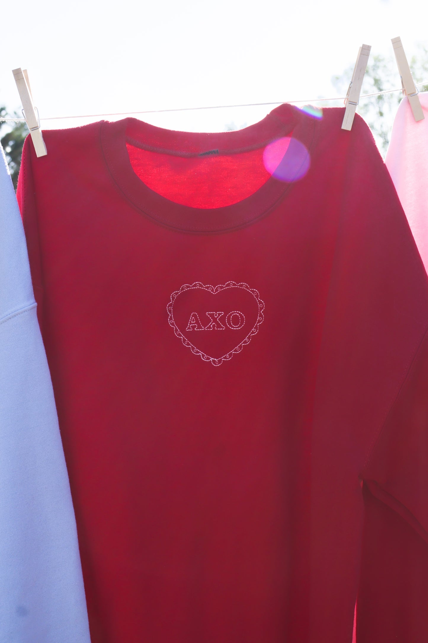 Alpha Chi Omega Embroidered Coquette Heart Crewneck
